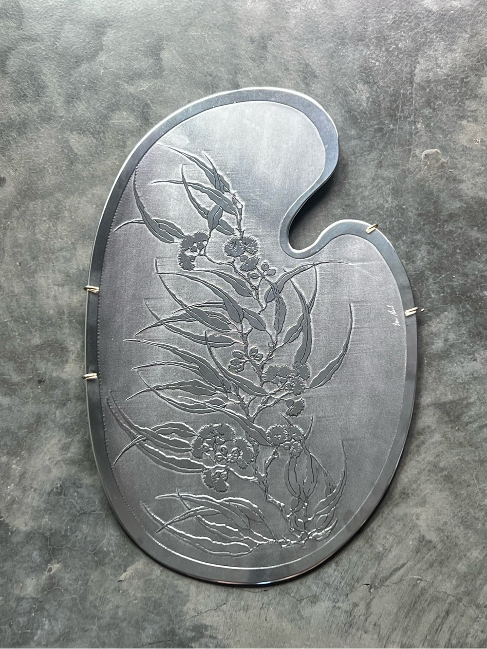 Palette-shaped brushed etched aluminum platter signed by artist Don Sheil